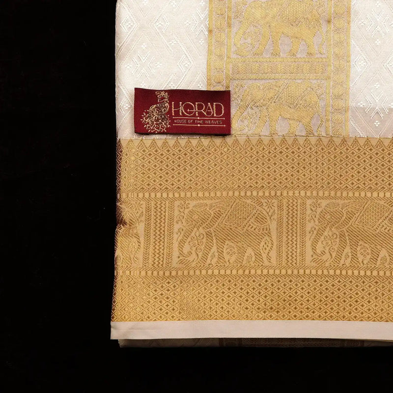 Horad Premium Art Silk Cream Emboss Elephant Shirt Material + Dhoti + Angavastram