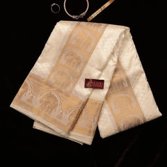 Horad Premium Art Silk Cream Emboss Elephant Border Shirt Material + Dhoti