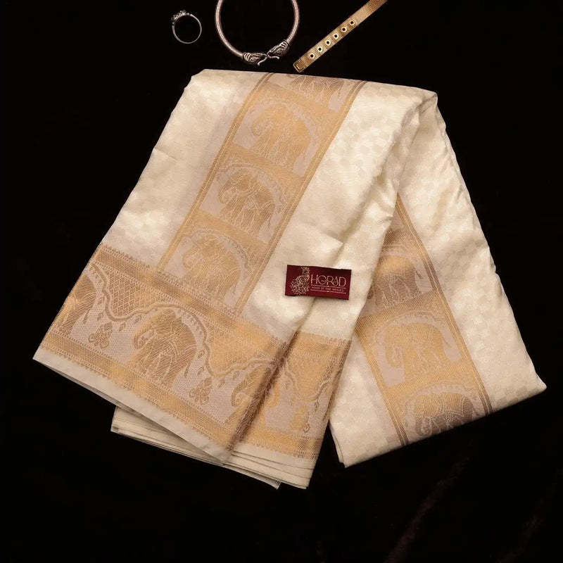 Horad Premium Art Silk Cream Emboss Elephant Border Shirt Material + Dhoti