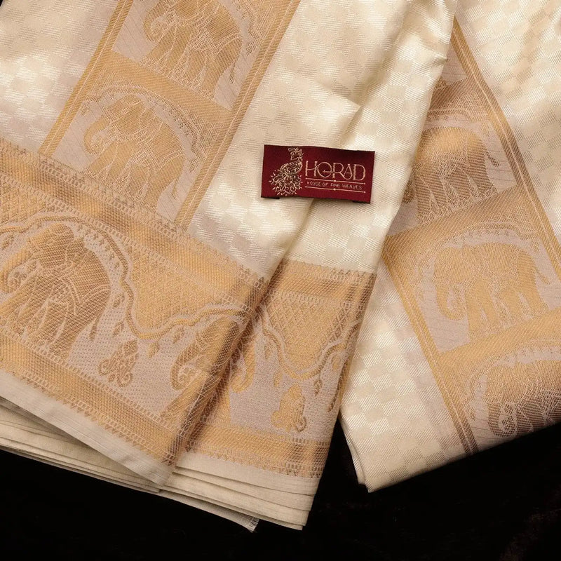 Horad Premium Art Silk Cream Emboss Elephant Border Shirt Material + Dhoti